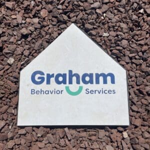 picture of baseball home plate with a logo and text on it
