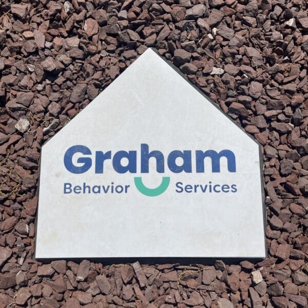 picture of baseball home plate with a logo and text on it