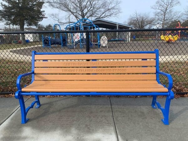 photo of a bench with an inscription