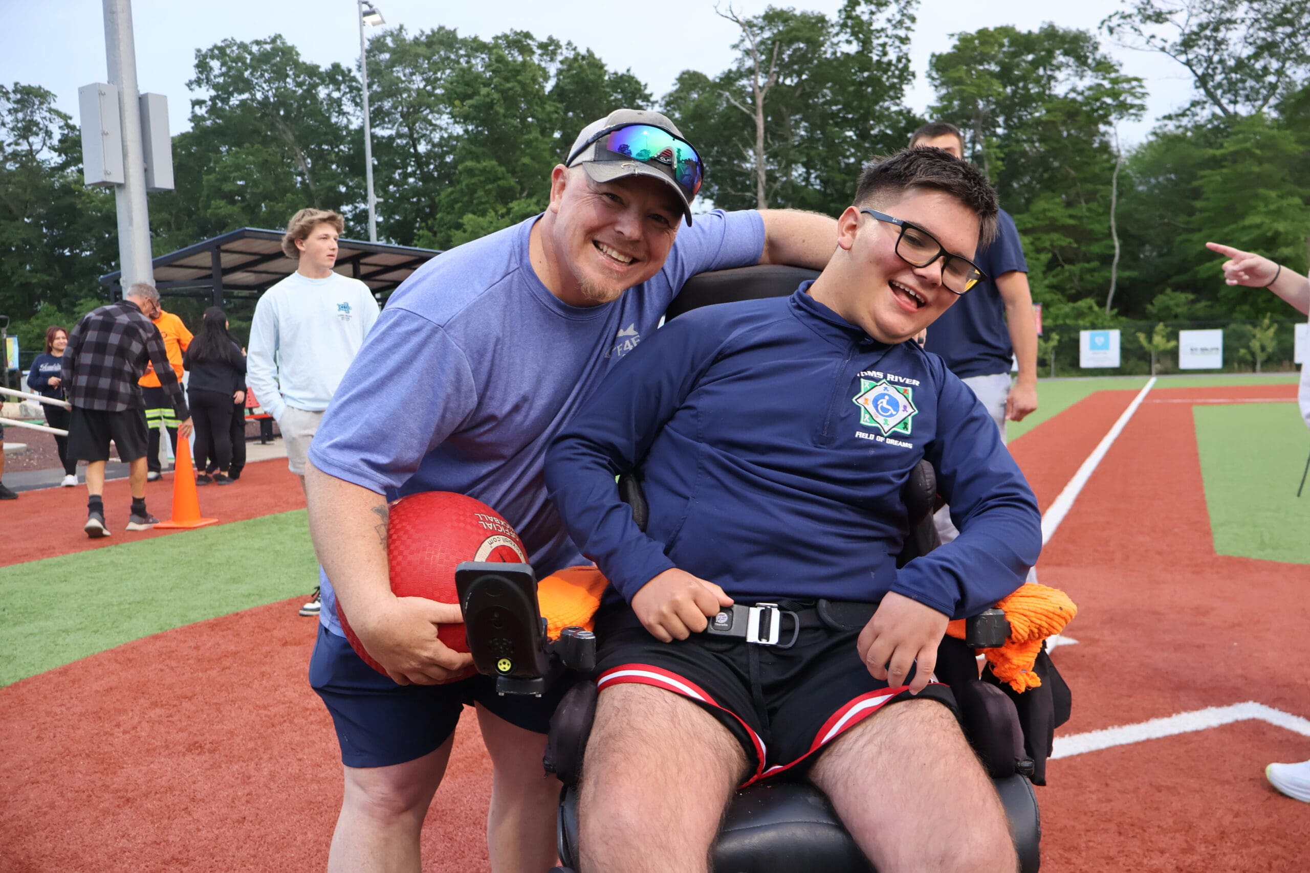 IMG_3045 Photo of a group of children holding a blind football